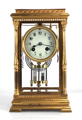 Lot 13 - A French gilt metal cased four glass mantle...