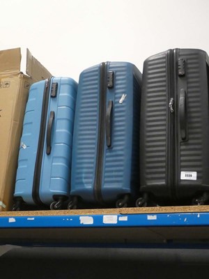 Lot 3339 - 3 large hard shelled American tourister suitcases