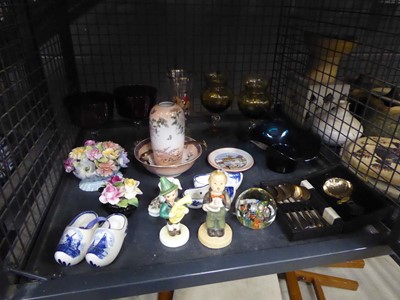 Lot 5501 - Cage containing teaspoons and a strainer,...