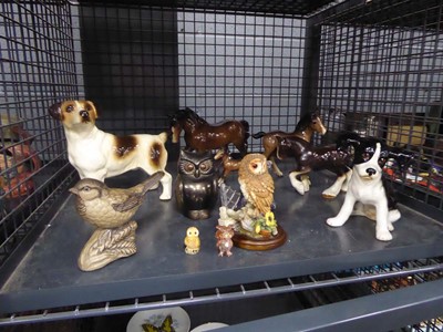 Lot 5512 - Cage containing ornamental horses and foals...