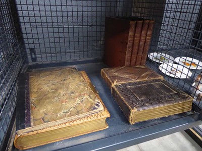 Lot 5514 - Cage containing photo albums and 4 volumes of...