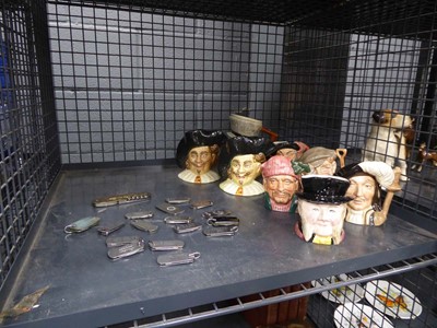 Lot 5515 - Cage containing character jugs and penknives