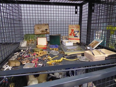Lot 5517 - Cage containing costume jewellery, London A-Z,...