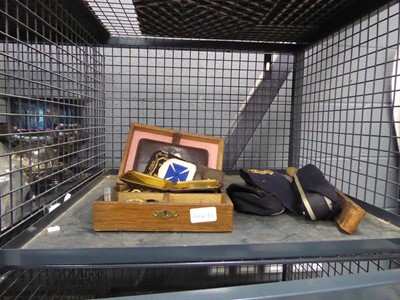 Lot 5478 - Cage containing military caps, plus insignia...