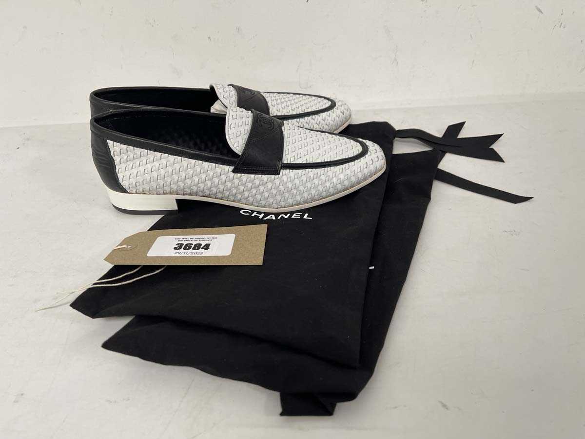 Lot 3684 - Chanel loafers in black / white size EU39.5...