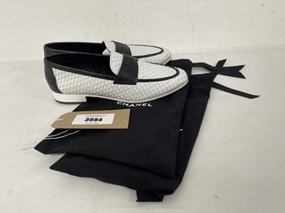 Lot 3684 - Chanel loafers in black / white size EU39.5...