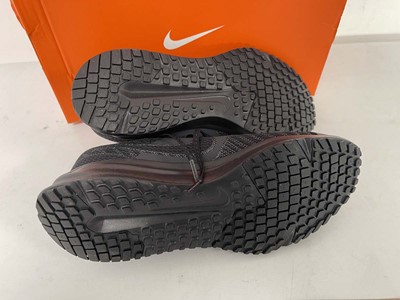 Lot 3691 - Nike run defy trainers in black size UK7.5 -...