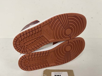 Lot 3737 - Nike air jordan 1 mid trainers in orange size...