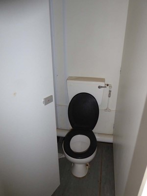 Lot 4024 - 9ft x 12 ft grey jack leg steel site toilet...