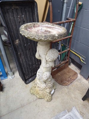 Lot 4203 - Concrete garden bird bath on cherub decorative...
