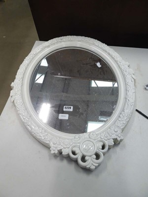 Lot 5228 - Oval mirror in ornate floral frame