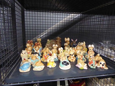 Lot 5503 - Cage containing Pendelfin rabbit figures