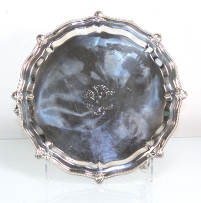 Lot 202 - A small silver salver of circular form with...