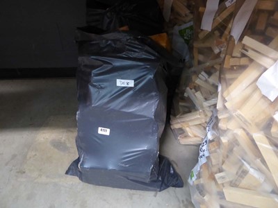 Lot 4111 - Three bags containing a quantity of fire logs