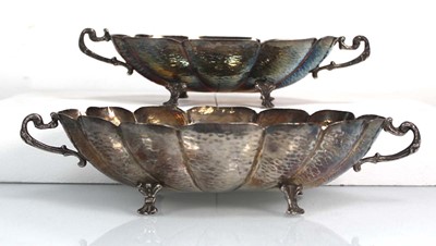 Lot 216 - A pair of graduated metalware two handled...