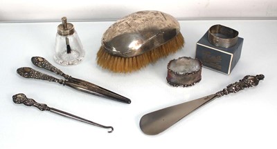 Lot 219 - A group of silver comprising a hairbrush, a...