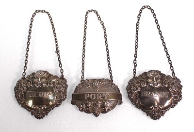 Lot 222 - A pair of silver decanter labels, each...