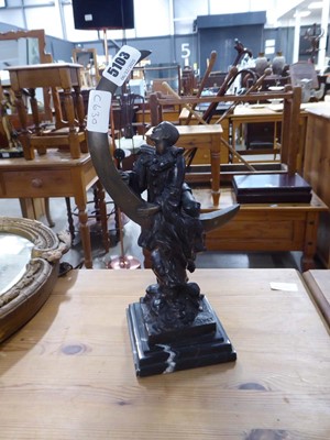 Lot 5103 - Cast iron figure, modelled as a harlequin...