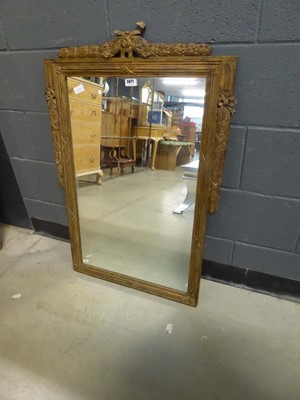 Lot 5071 - Rectangular mirror in a carved giltwood frame