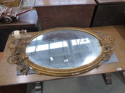 Lot 5234 - Oval Regency mirror in decorative frame