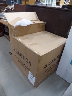 Lot 5236 - Flat pack tan leather chair, boxed