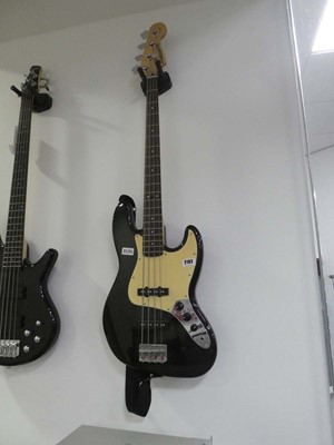 Lot 2102 - Starcaster 4 string base guitar in black and...