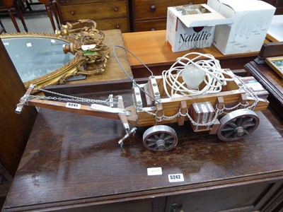 Lot 5241 - Table lamp with cart shaped stand