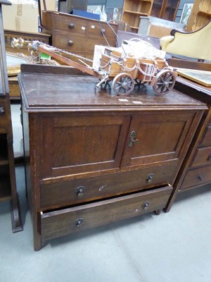 Lot 5242 - Oak double door cupboard with two drawers under