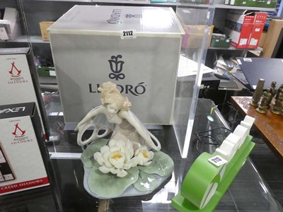 Lot 2112 - Lladro figure of a fairy with lilies