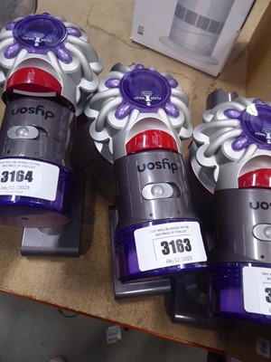 Lot 3163 - Handheld Dyson V8 with pole, head, attachments...