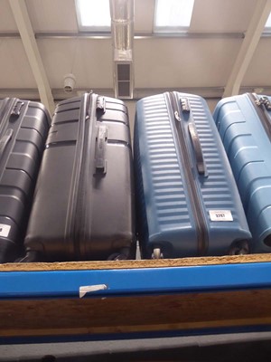 Lot 3267 - 2 large hard shelled American Tourister suitcases