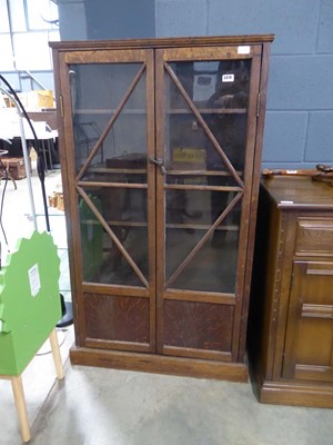 Lot 5319 - Glazed oak double door bookcase