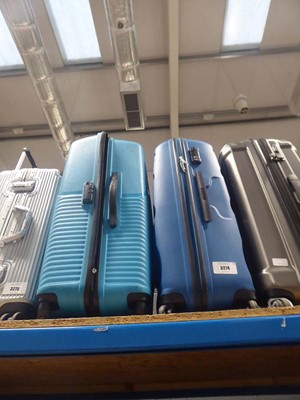 Lot 3274 - 2 large hard shelled American Tourister suitcases