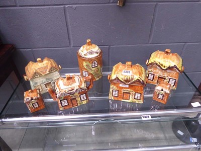 Lot 5330 - Quantity of cottage patterned teapots, biscuit...