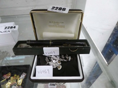 Lot 2286 - Box containing vintage badges along with a...