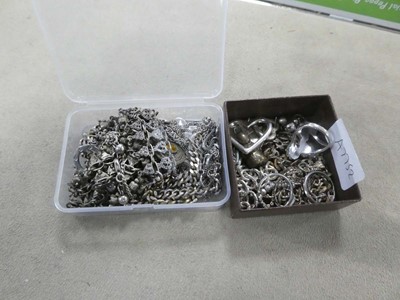 Lot 2309 - 2 boxes containing white metal chains, rings, etc