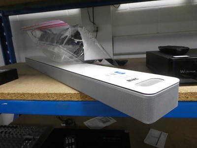 Lot 2418 - Bose soundbar with wall brackets, surround...