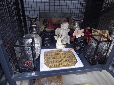 Lot 5507 - Cage containing cherub, fairy, skull shaped...