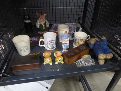 Lot 5517 - Cage containing postcards, toys, commemorative...