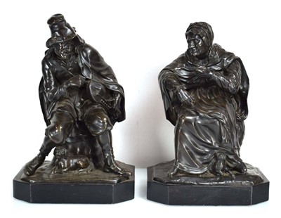 Lot 1 - A bronze figural group modelled as a man...