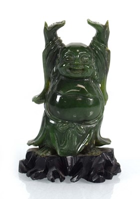 Lot 17 - A 20th century jadeite figure modelled as...
