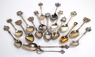 Lot 232 - Seventeen silver and metalware souvenir spoons,...