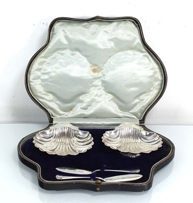 Lot 241 - A pair of early 20th century silver butter...