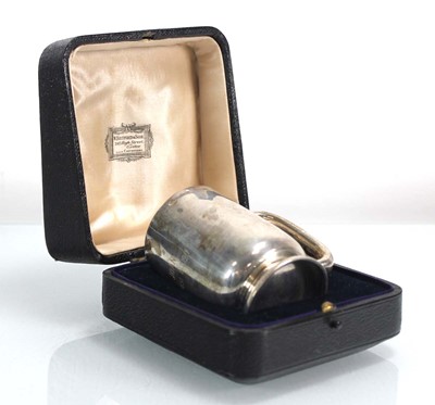 Lot 251 - A late Victorian silver gilt Christening mug,...