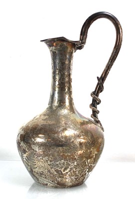 Lot 256 - A Victorian silver jug of slender form with...
