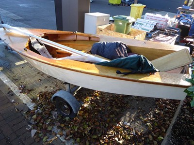 Lot 4137 - Wooden sailing dinghy on single-axle trailer