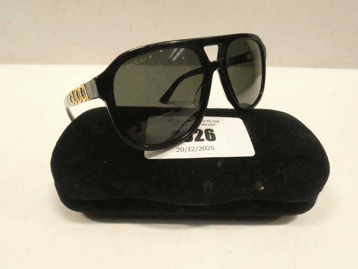 Lot 2026 - Gucci GG1188S sunglasses with case