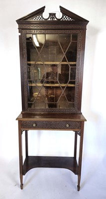 Lot 5 - An early 20th century mahogany bookcase on...