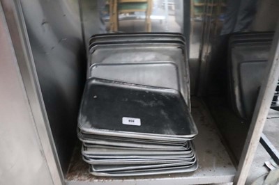 Lot 659 - Stack of various size aluminium oven dishes