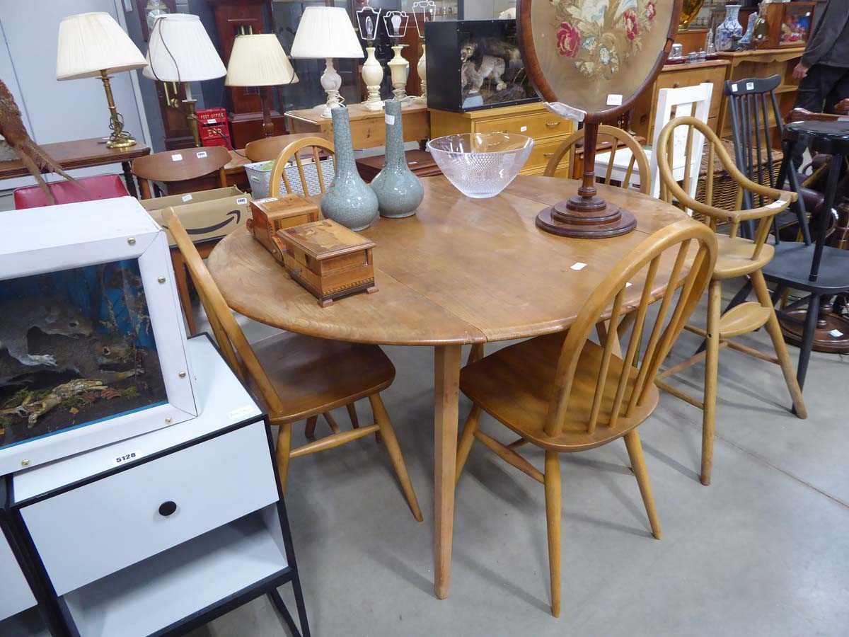 Lot 5130 - Ercol drop side table plus four stick back chairs
